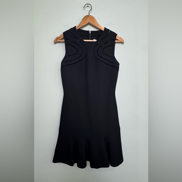 Diane Von Furstenberg Maureen Dress‎ LBD Laser Cut
Flounce Dress Size 2 - Picture 4 of 14